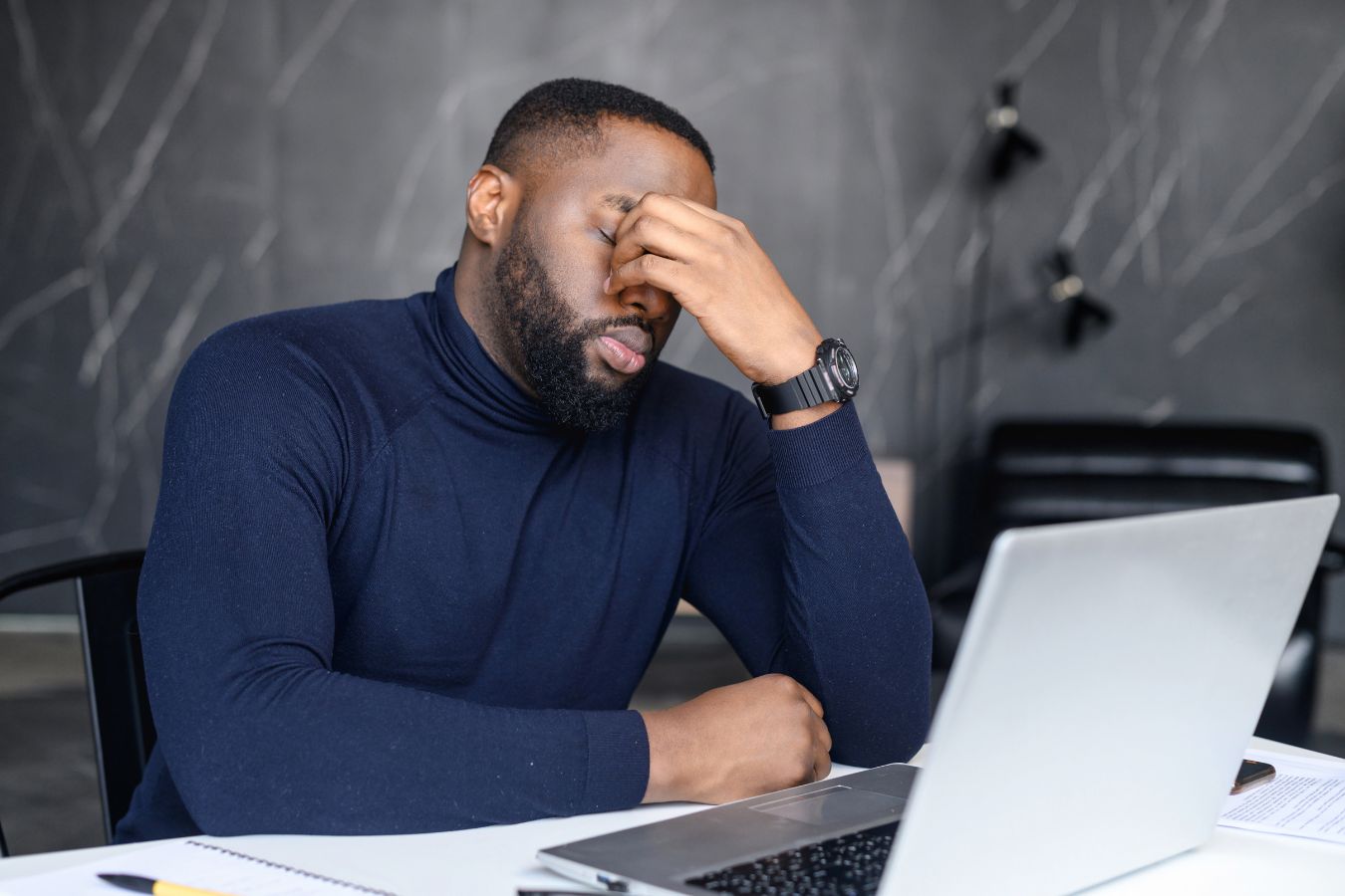 Business owner managing growing customer service workload